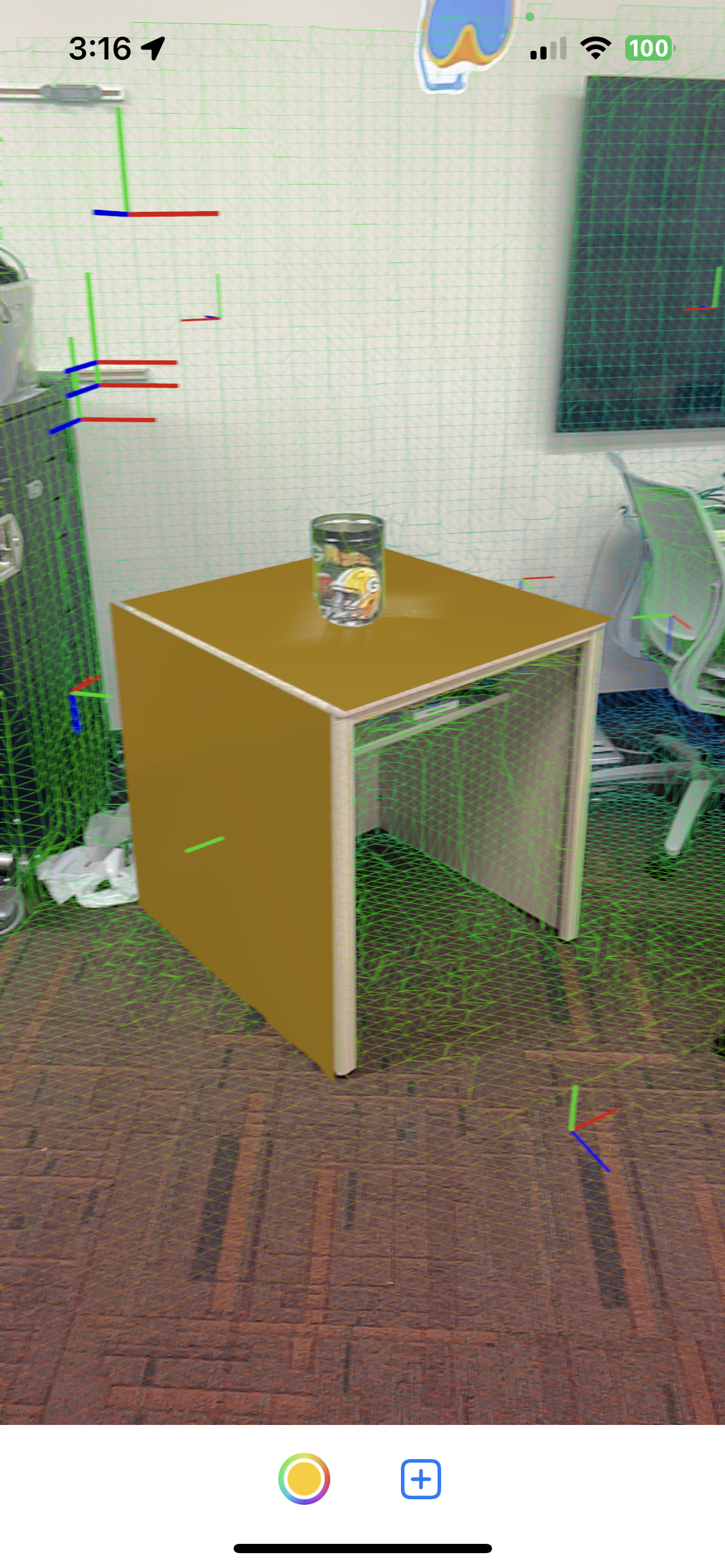 A screenshot showing object occlusion in my AR app using a jar on top of a virtual plane placed on a table.